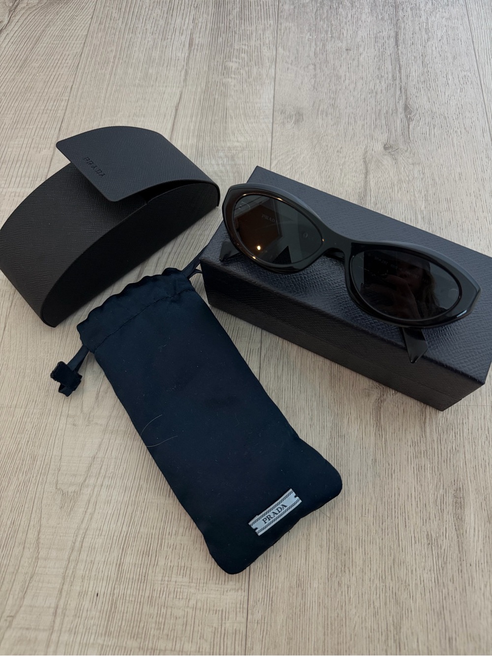 Prada Symbole Black Oval Sunglasses